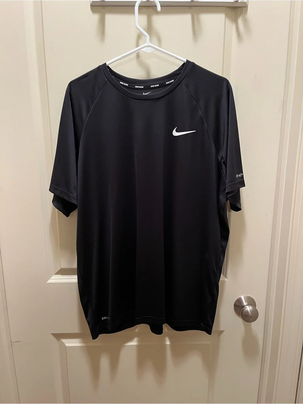 Nike Black Short Sleeve Dri-FIT UPF 40+ Tee with White Swoosh